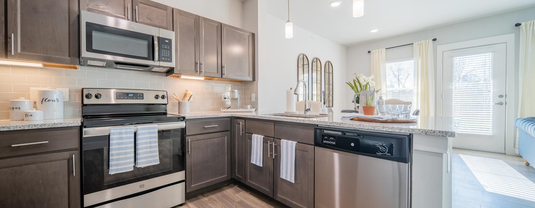 a kitchen with stainless steel appliances