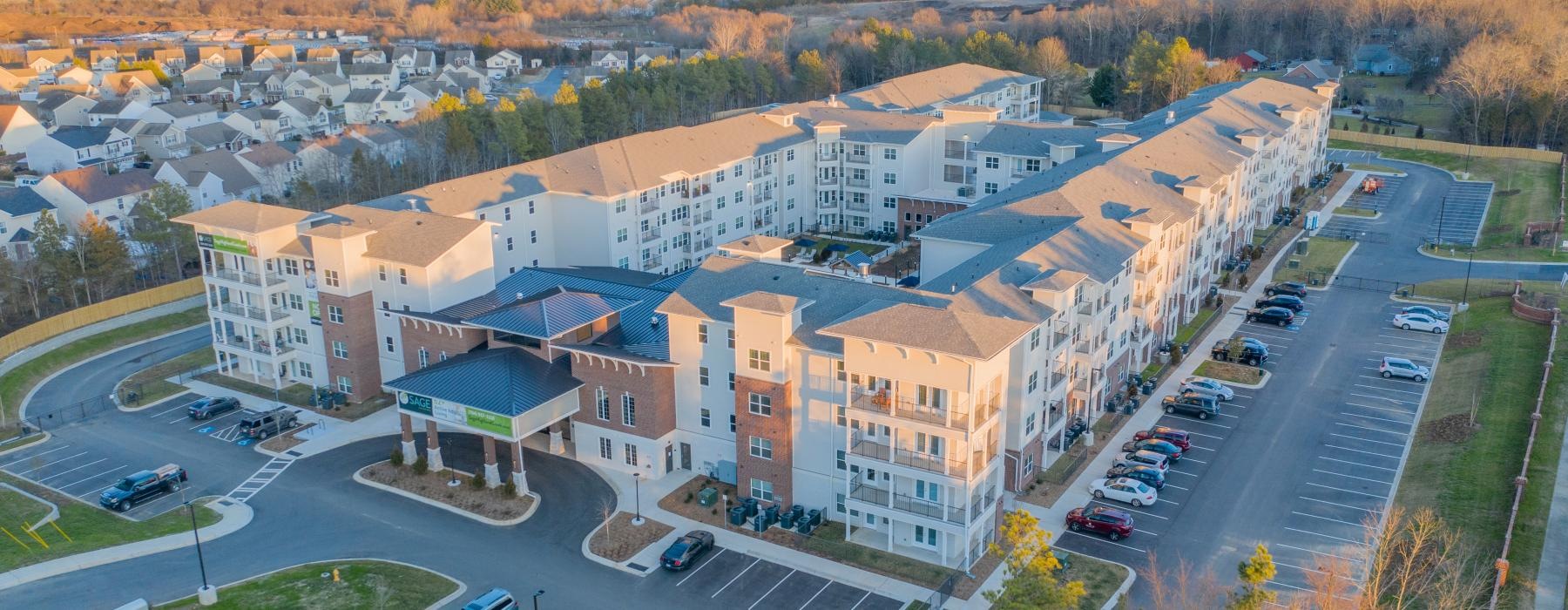 a large building with a parking lot